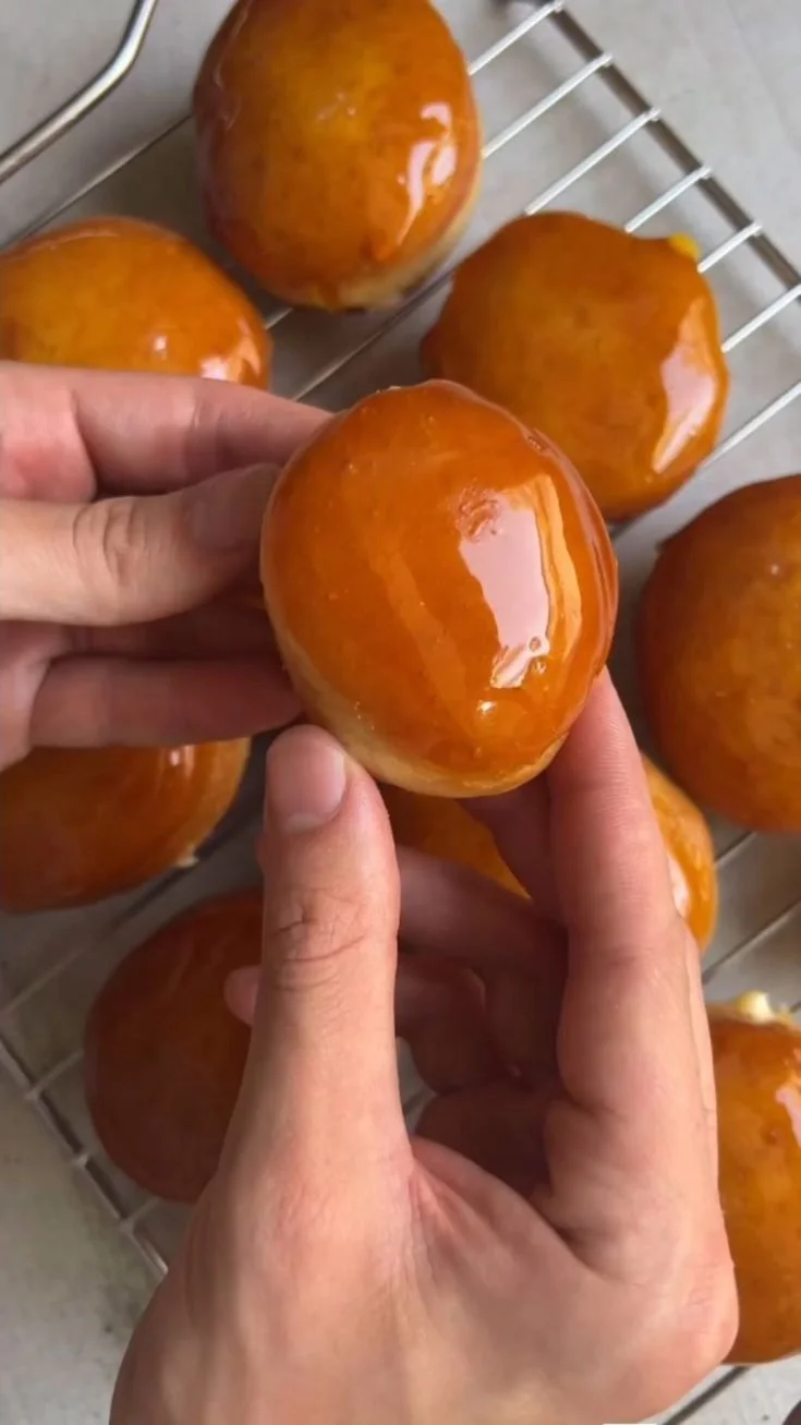 A rich Crème Brûlée dessert with a perfectly caramelized sugar topping.