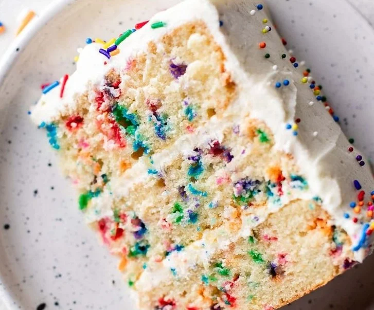 Delicious Funfetti Cake with colorful sprinkles and creamy frosting