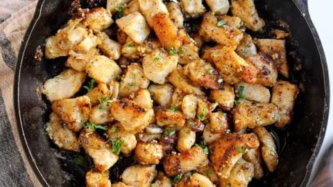 Delicious Garlic Butter Chicken Bites served in a skillet.