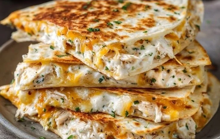 High-protein chicken ranch quesadilla with melted cheese and fresh ingredients.
