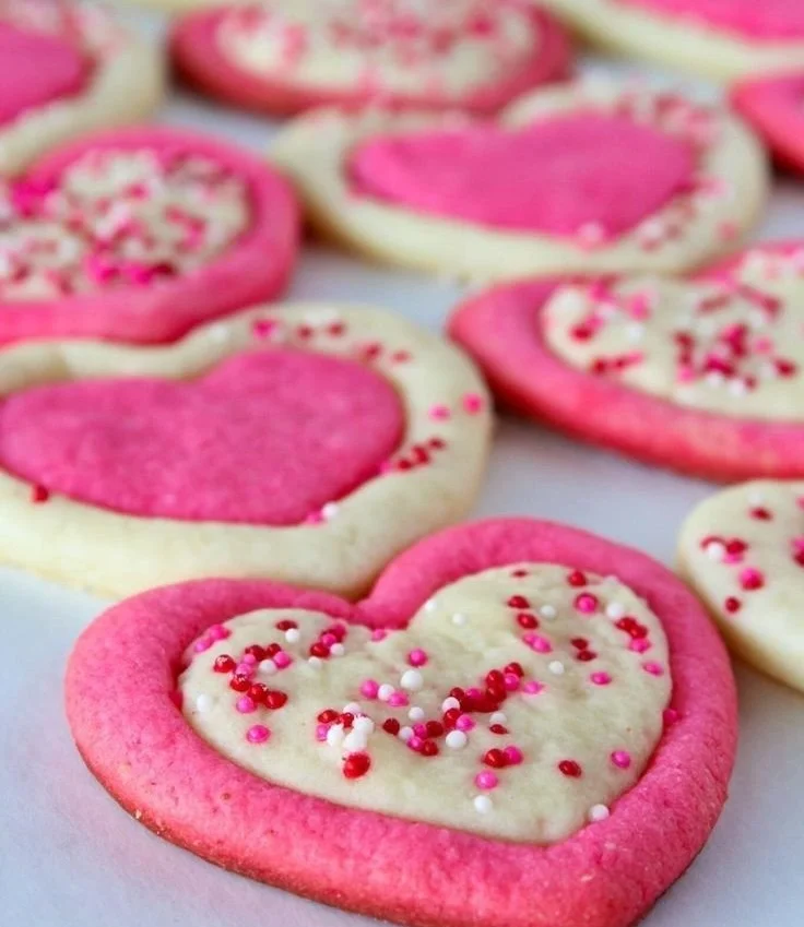 Homemade Valentine's cookies with heart designs and festive decorations