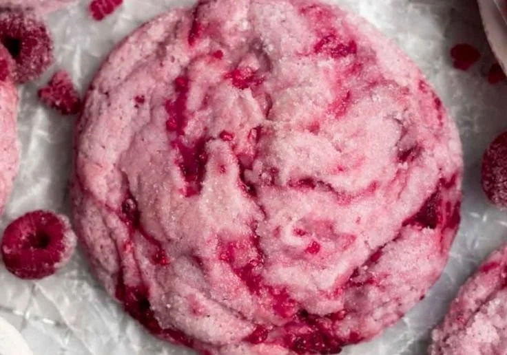 Soft and chewy raspberry sugar cookies on a plate, perfect for dessert