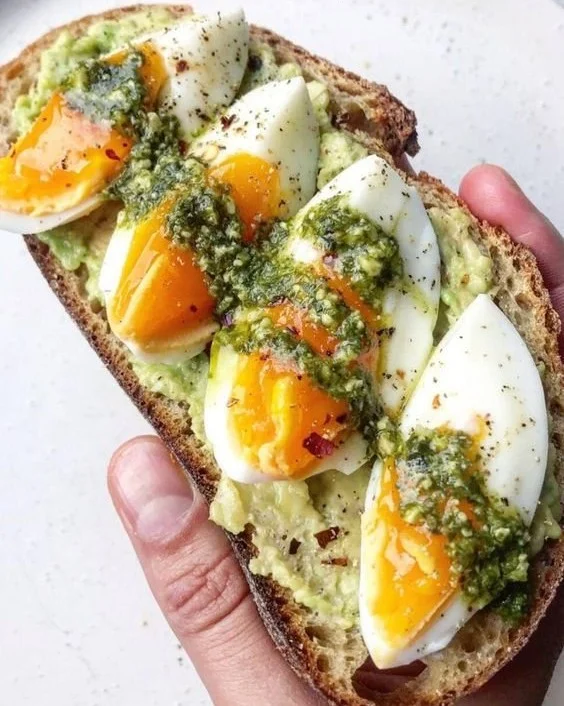 Avocado Pesto Toast with Eggs, a tasty and nutritious breakfast option.