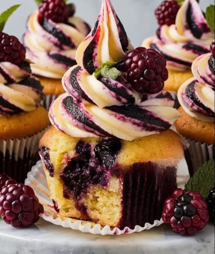 Delicious Berry Swirl Cupcakes with vibrant berry frosting and decorations