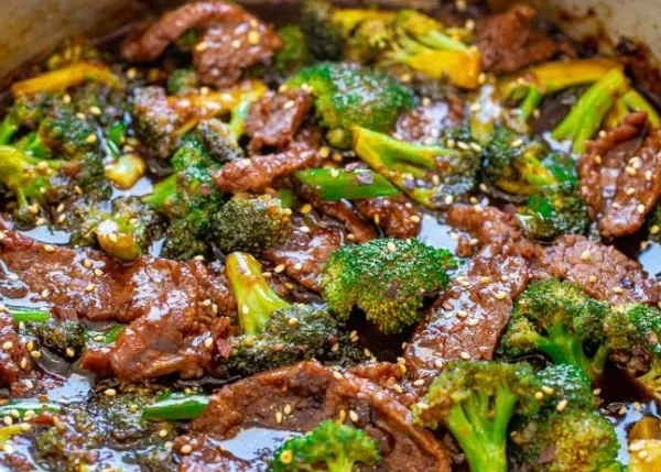 Delicious plate of homemade beef with broccoli served over rice.