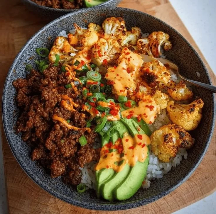 Crispy Chile Ground Beef served in a protein bowl with cauliflower for a healthy meal.