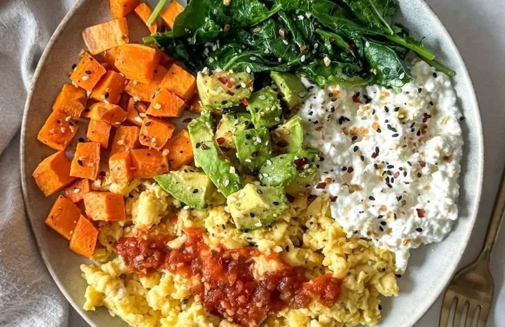 Healthy dietitian's balanced breakfast bowl with fruits, grains, and nuts