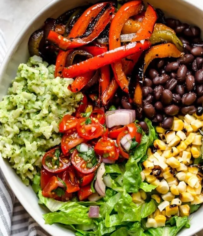 Delicious grilled veggie burrito bowl with fresh ingredients and vibrant colors