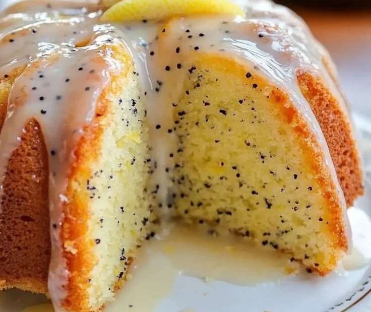 Delicious lemon poppy seed cake topped with fresh lemon glaze.