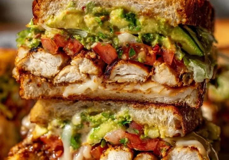 Loaded Chicken and Avocado Sandwich with fresh ingredients and toppings