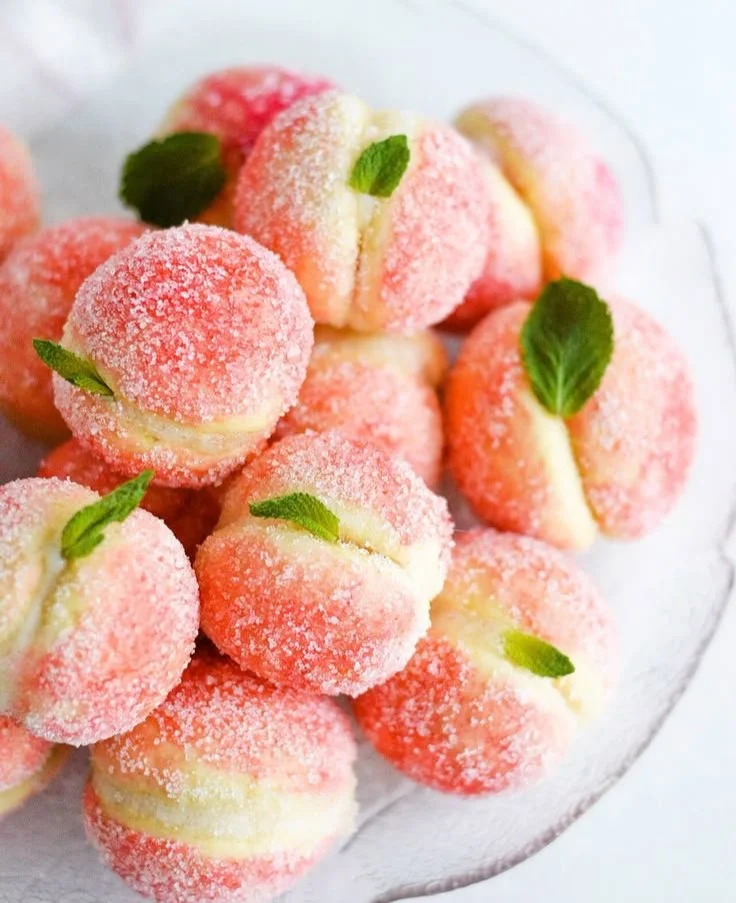 Delicious orange infused sweet ricotta peach cookies on a plate