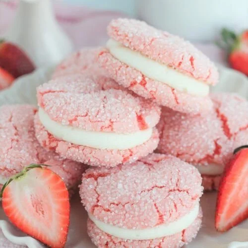 Soft Strawberry Cake Mix Sandwich Cookies with frosting