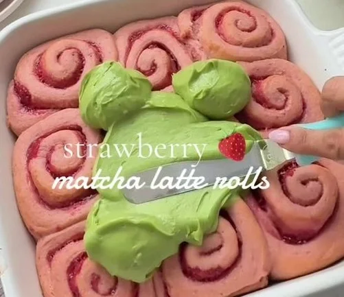Delicious Strawberry Matcha Latte Rolls topped with fresh strawberries and green matcha powder