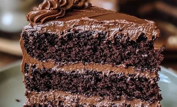 Slice of Triple Matilda Chocolate Cake with chocolate frosting