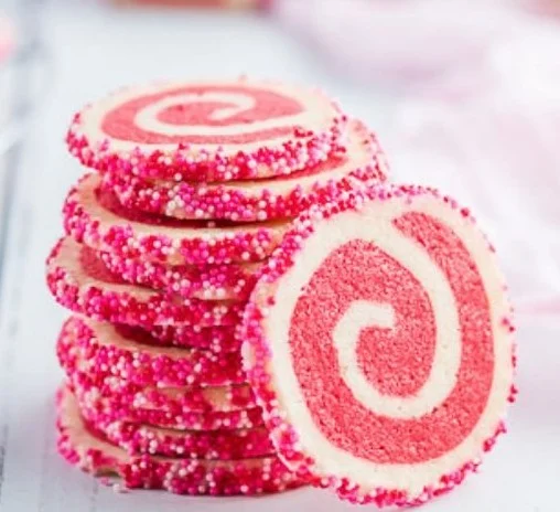 Valentine's Day swirl cookies decorated with red and pink icing