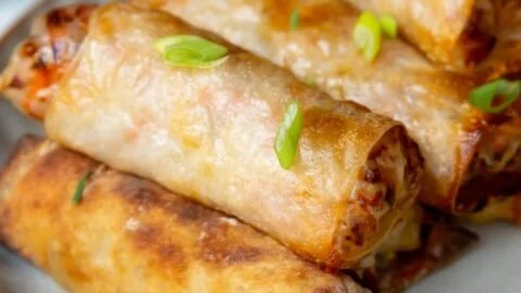 Crispy air fryer spring rolls ready to be served.