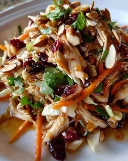 Bowl of Asian Chicken Cranberry Salad with vibrant ingredients
