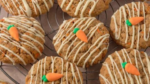 Delicious carrot cake cookies with frosting on a plate, perfect for desserts.