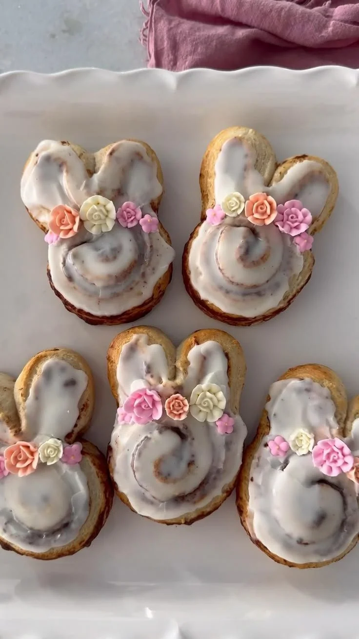 Easter Bunny Cinnamon Rolls decorated with icing and colorful sprinkles