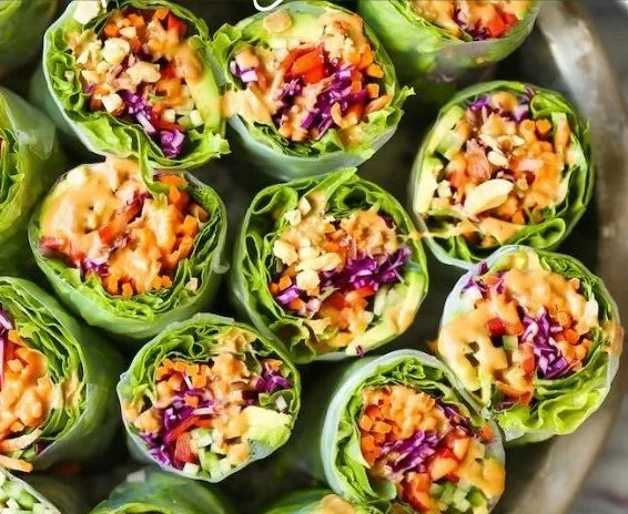 Fresh spring rolls with peanut sauce served on a plate