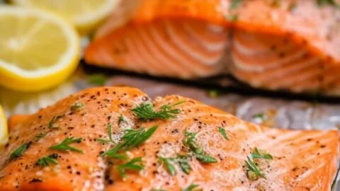 Gordon Ramsay's recipe for pan fried salmon on a plate with vegetables