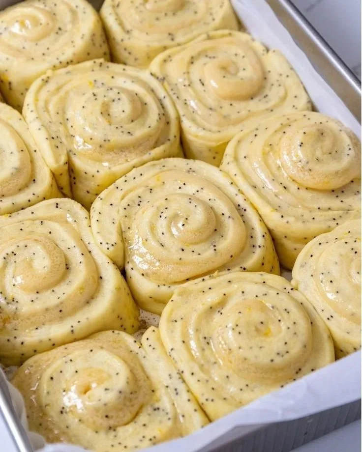 Freshly baked lemon rolls with a citrus glaze