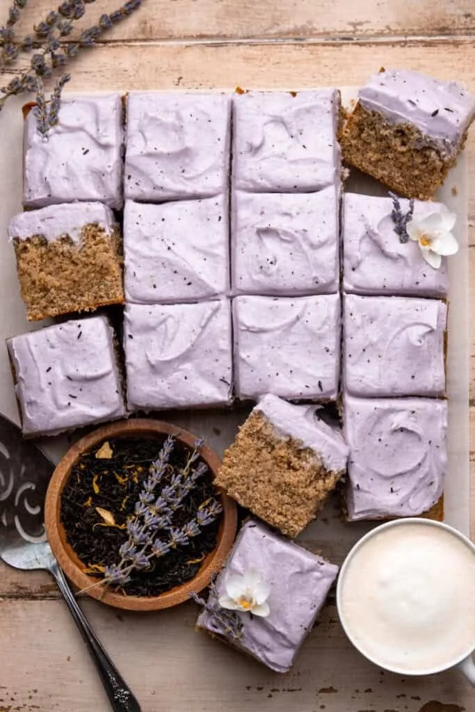 Slice of London Fog Cake with Earl Grey frosting on a decorative plate