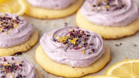 Soft lemon blueberry cookies topped with fresh blueberries and lemon zest