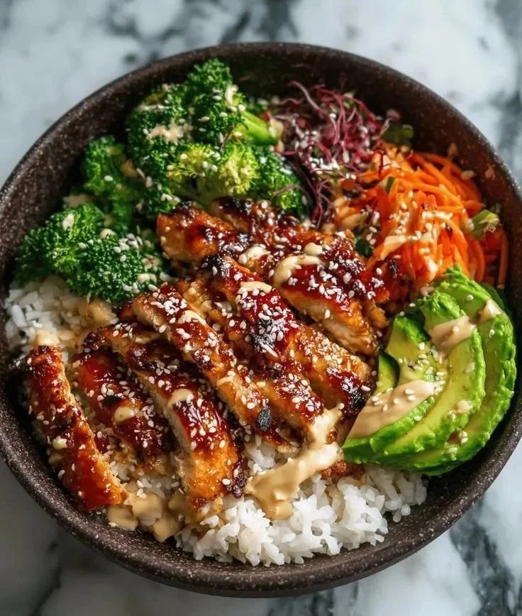 Delicious Sticky Chicken Bowl with rice and vegetables.