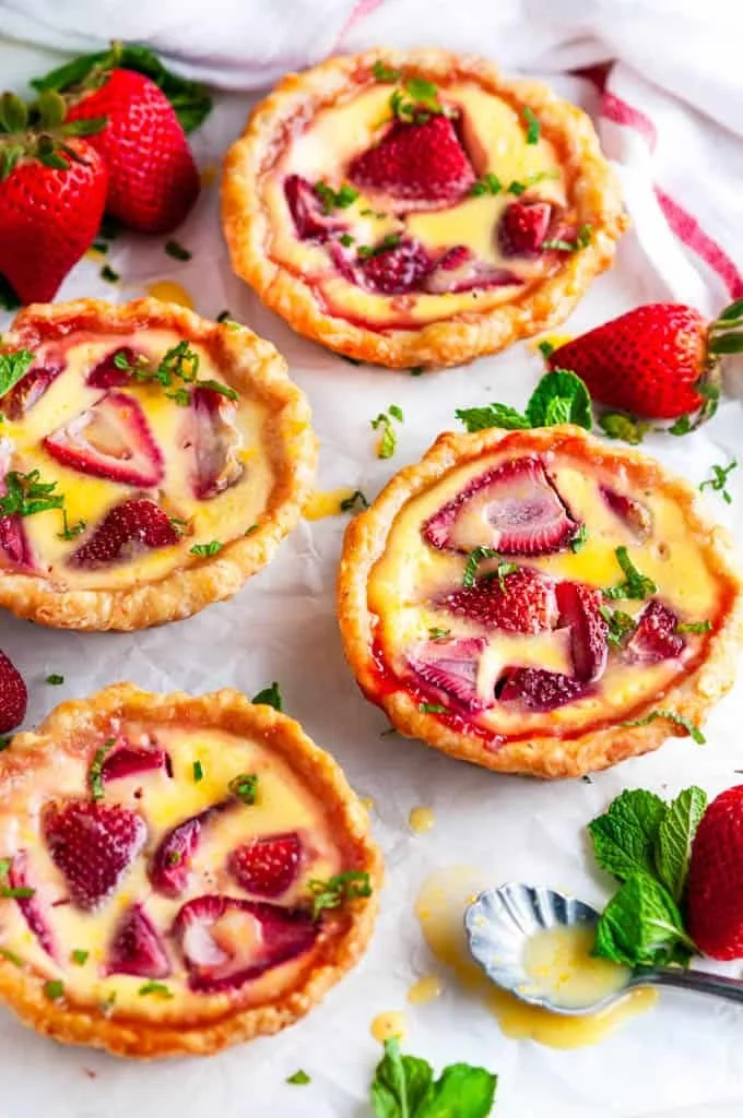Strawberry Honey Custard Tarts with a lemon curd topping
