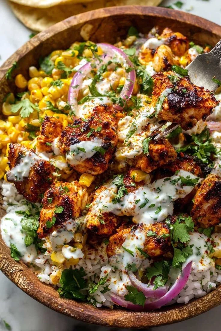 Delicious street corn chicken bowl with grilled chicken and corn toppings