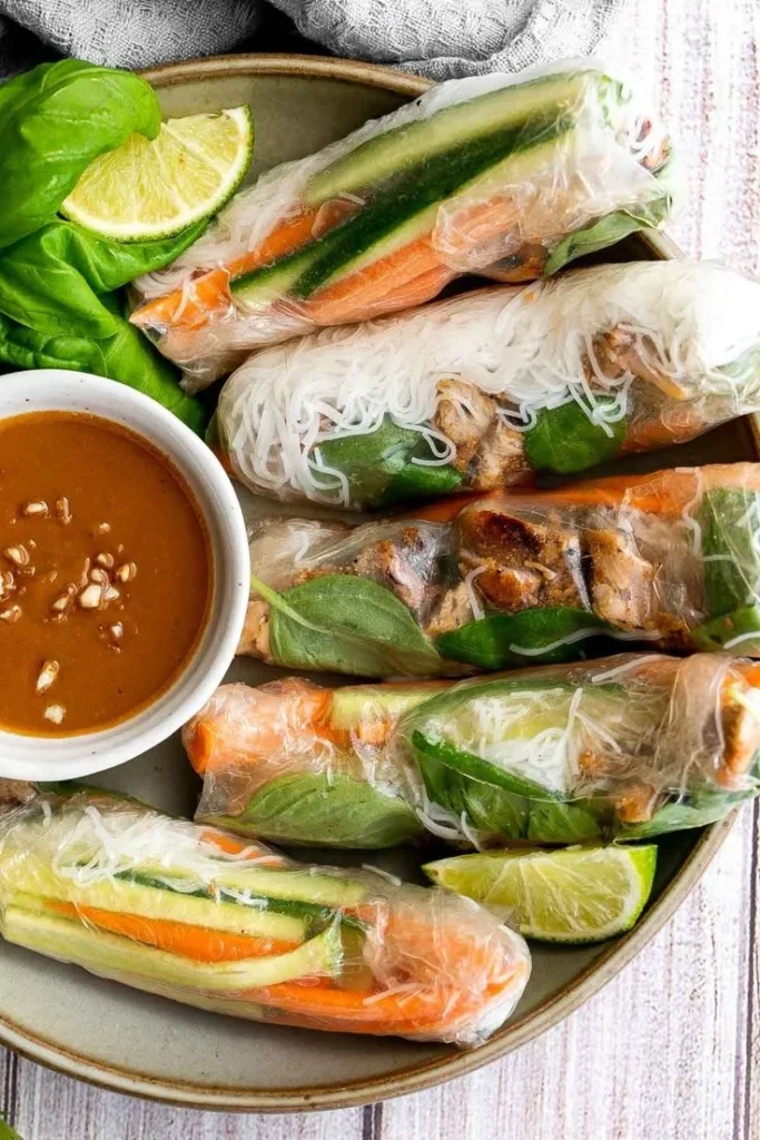 Delicious Vietnamese summer rolls with chicken and fresh vegetables