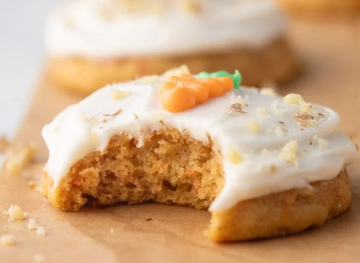 Delicious carrot cake cookies with cream cheese frosting on a plate