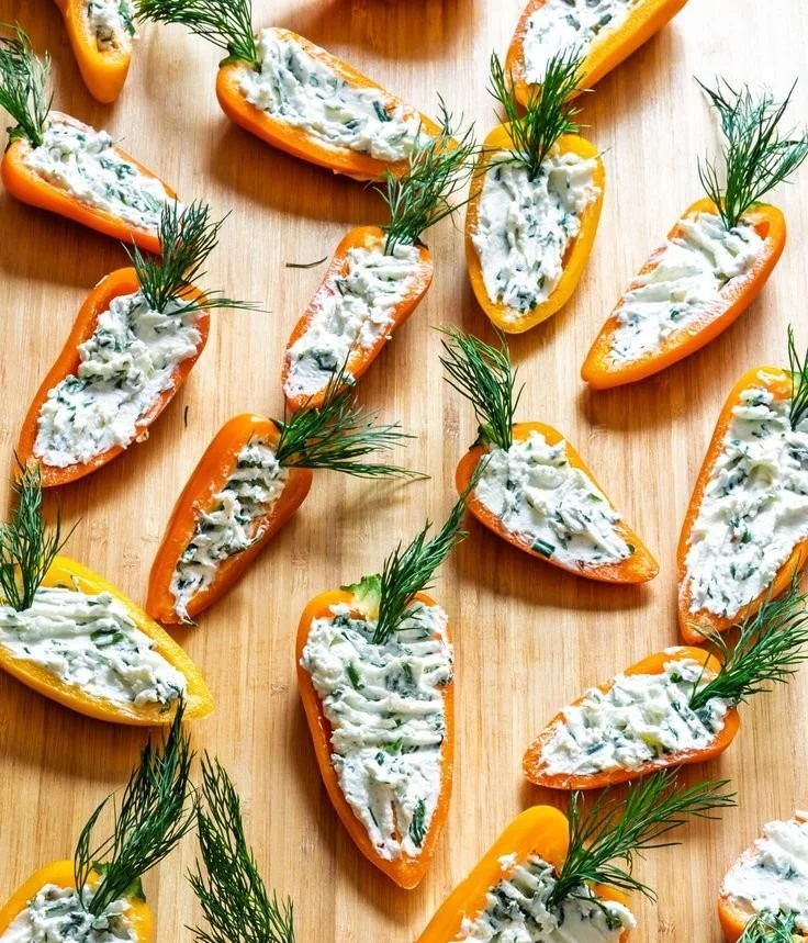 Carrot-shaped stuffed mini peppers filled with a tasty mixture