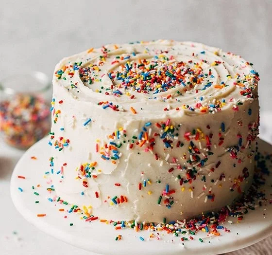Delicious Funfetti Cake with colorful sprinkles on top
