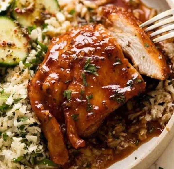 Delicious Honey Garlic Chicken dish served with vegetables and rice