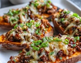 Hot honey ground beef stuffed in sweet potato boats for a healthy dinner