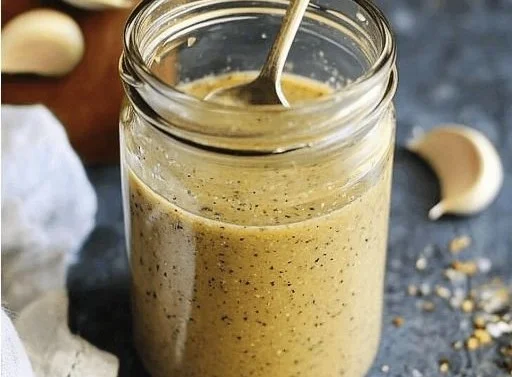 Delicious homemade Italian Vinaigrette over fresh salad greens