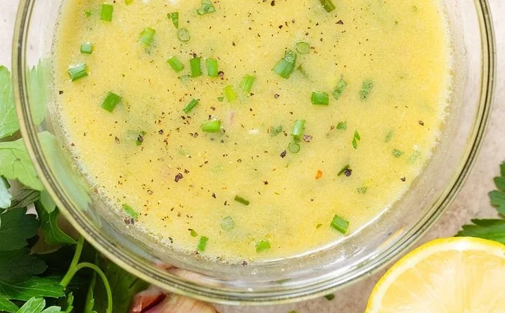 Delicious Lemon Shallot Vinaigrette drizzled on a fresh salad