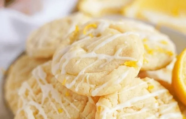 Delicious lemon sugar cookies on a plate, perfect for baking enthusiasts.