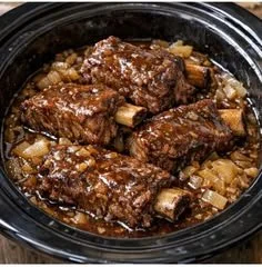 Delicious slow cooker short ribs served with vegetables