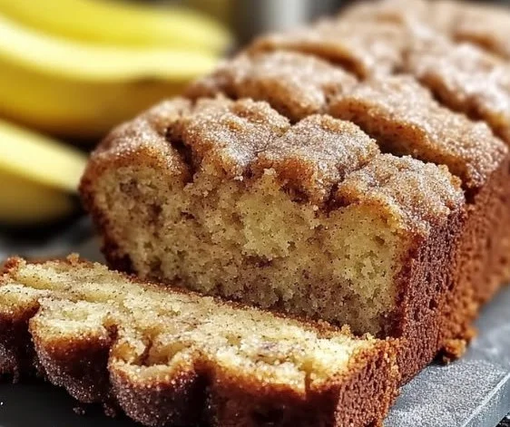 Deliciously moist snickerdoodle banana bread showcased on a rustic wooden table