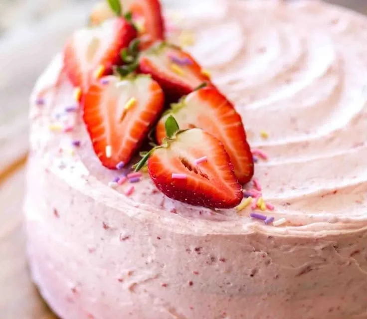 Strawberry Funfetti Cake with Strawberry Buttercream served on a plate