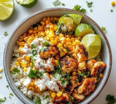 Delicious Street Corn Chicken Rice Bowl with chicken, corn, and spices