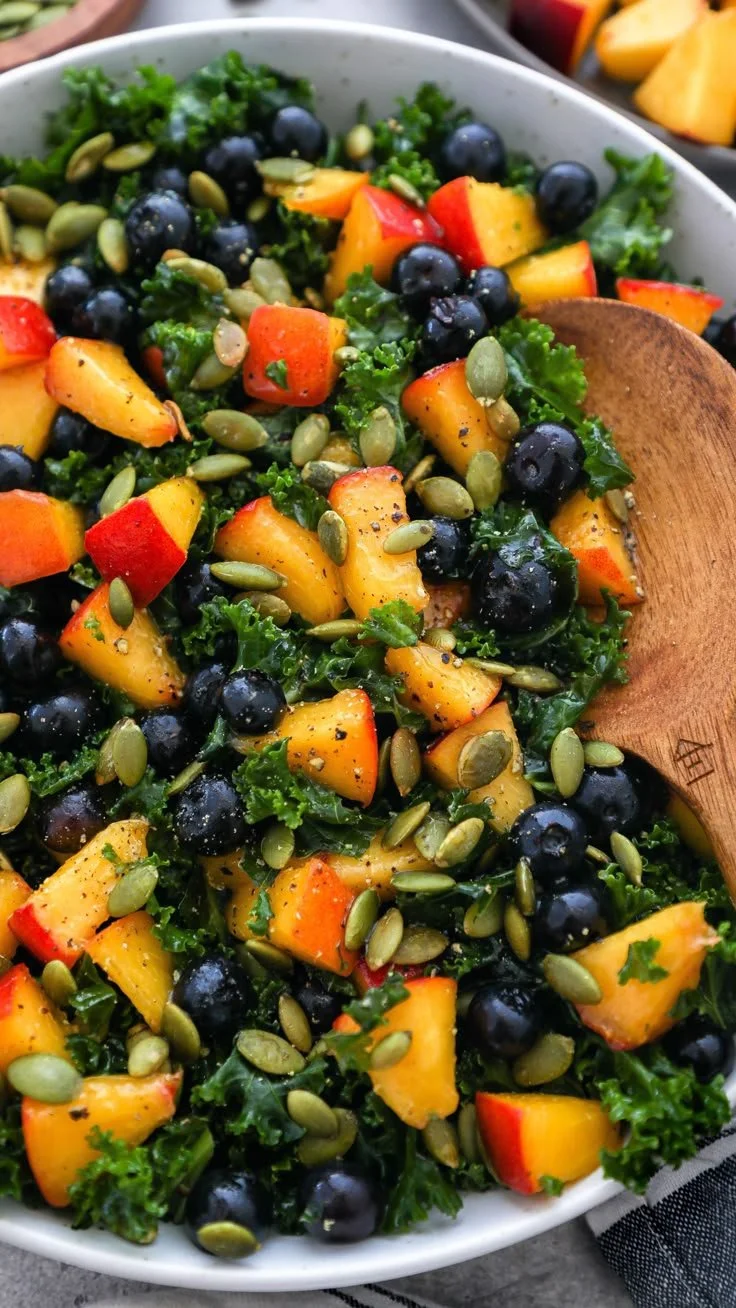 Fresh and colorful summer kale salad with vibrant ingredients