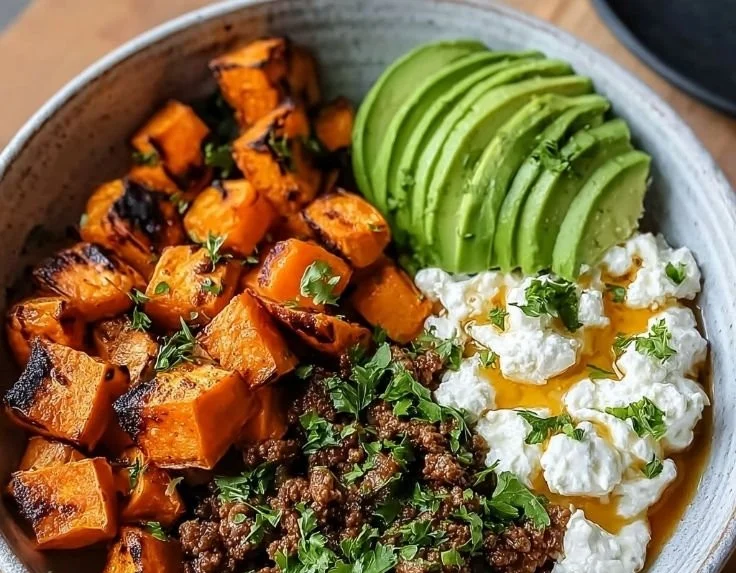 Viral hot honey bowl with ground beef, drizzled with honey and garnished with vegetables