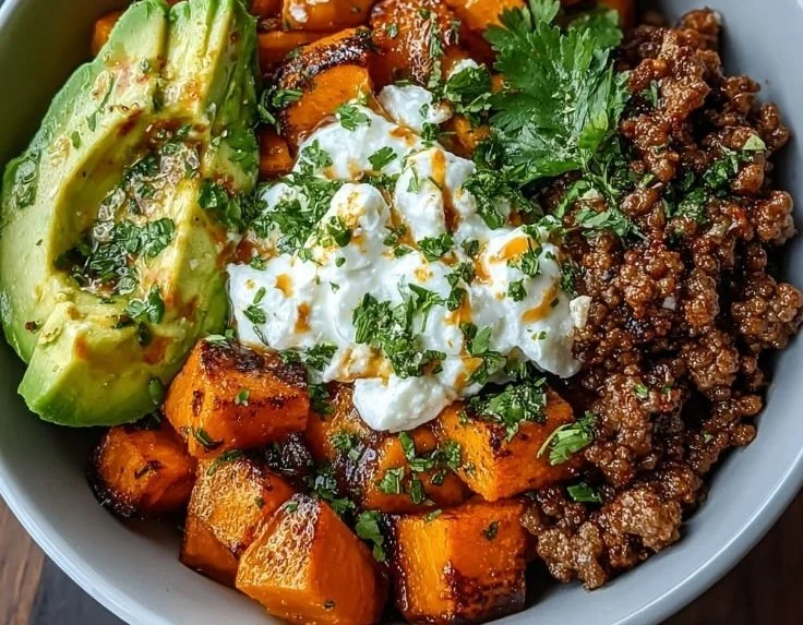 Delicious Ground Beef Hot Honey Bowl topped with honey drizzle and spices