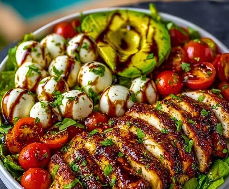 Baked Marinated Chicken Salad with Mozzarella and Balsamic Vinaigrette in a bowl