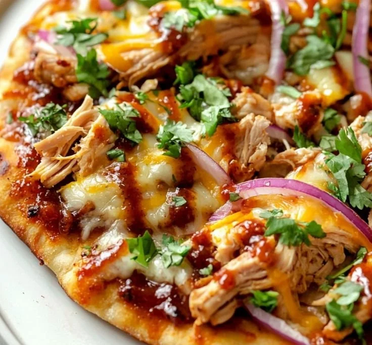 Delicious BBQ Chicken Flatbread topped with grilled chicken and fresh ingredients