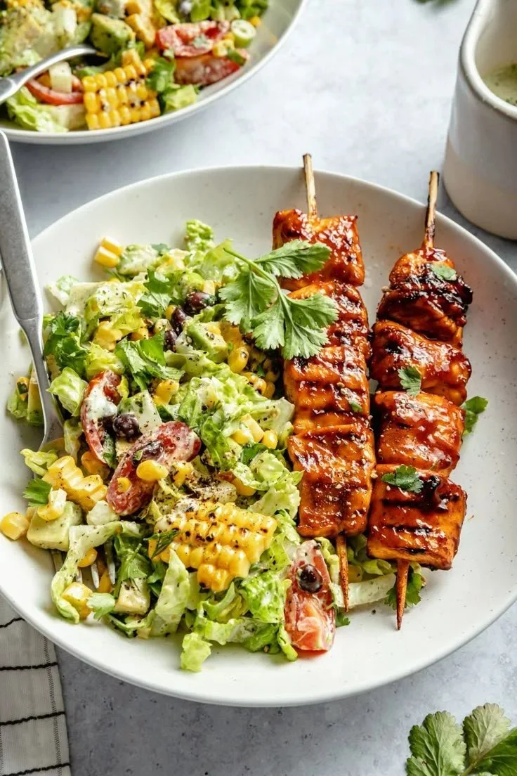 BBQ Chicken Skewer Salad with colorful vegetables and grilled chicken skewers